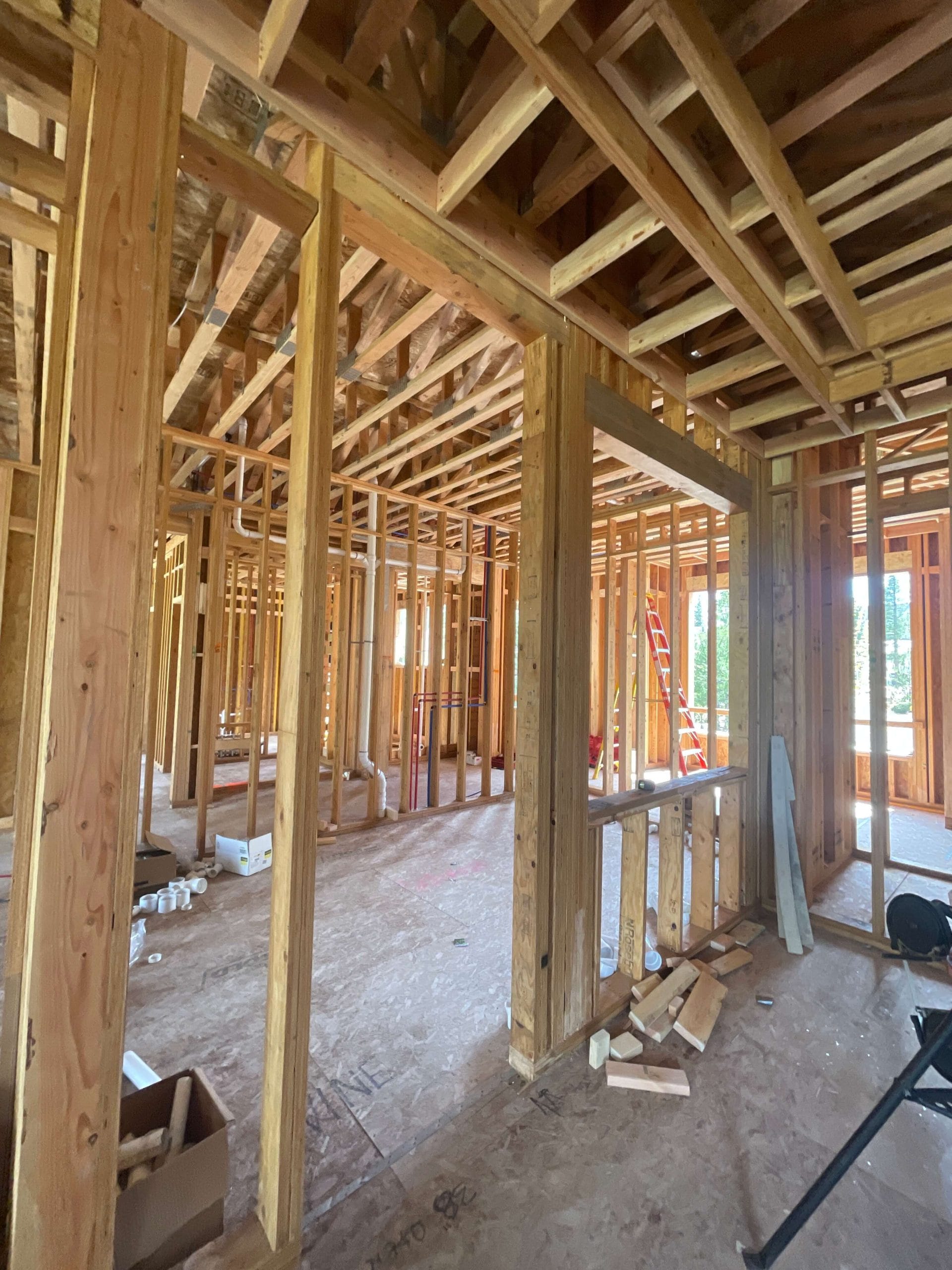 Custom wine cellar framing structure during residential construction phase