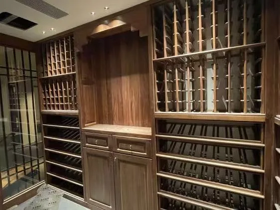 Luxury wine cellar with custom wood racking, cabinetry, and integrated bottle storage.